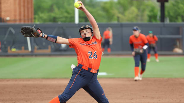 Savanah Henley delivers a pitch during the Virginia softball game against Louisville at Palmer Park.